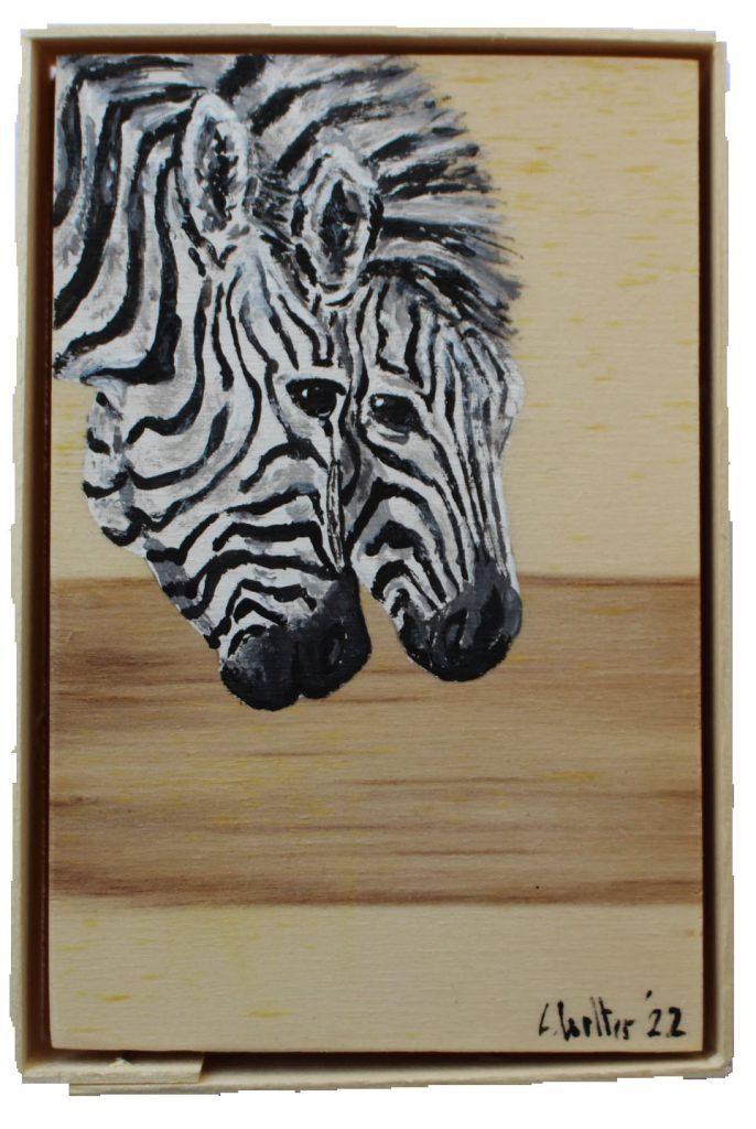 Zwei Zebras gemalt mit Acrylfarbe auf einer unbemalten Sperrholzplatte